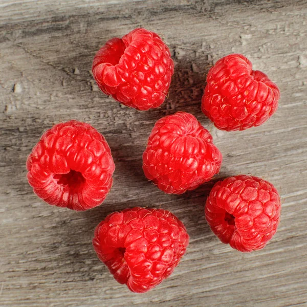 Top View Photo Six Red Raspberries Gray Wooden Table — Stock Photo, Image