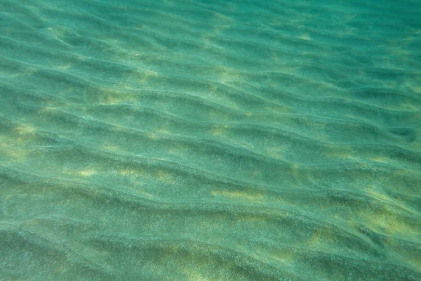 Havsbotten undervattensfoto, "sanddyner" i sand upplyst av solljus. Ab — Stockfoto