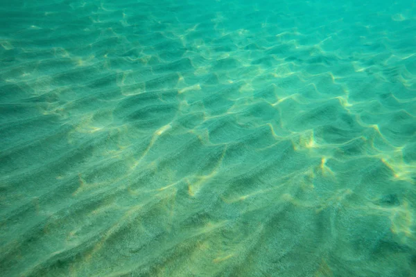 Ocean Floor undervattensfoto, sand "sanddyner" upplyst av solljus. Abst — Stockfoto