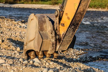 Kazıcı (kazıcı makinesi) r tarafından zemin kazıcı kova taşlar