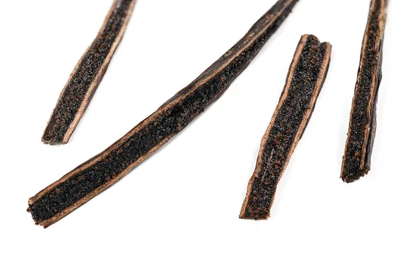 Vanilla pods cut with knife, black seeds visible, closeup macro detail photo isolated on white background — Stock Photo, Image