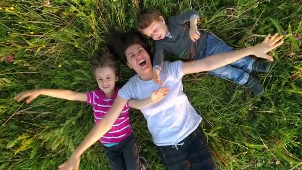 Funny Ecstatic Family Relaxing Laughing Looking Slow Motion Top View — Stock Video