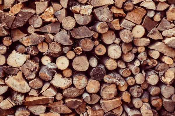 chopped wood wall, fuel for winter, background for text