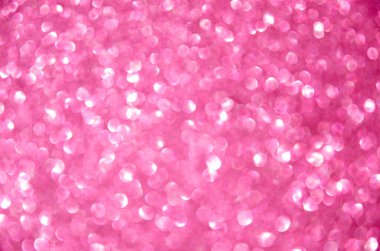 Açık mor odaklı simli ışıklar arka planda. Yuvarlak odaklı ışıklar. Kopyalama alanı ve metin yeri olan soyut bokeh arkaplanı