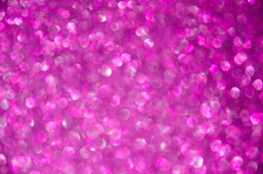 Yumuşak mor odaklı simli ışıklar arka planda. Yuvarlak odaklı ışıklar. Kopyalama alanı ve metin yeri olan soyut bokeh arkaplanı