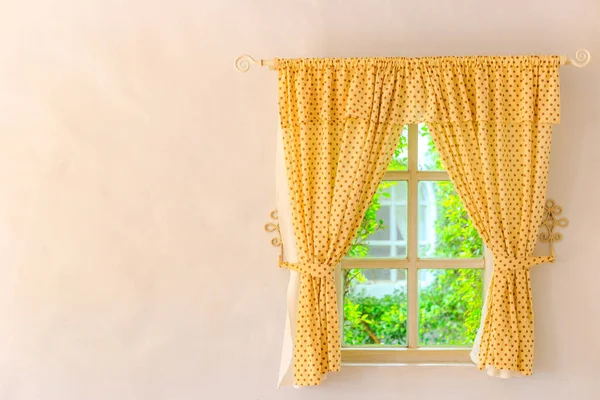 window and curtain in the room.