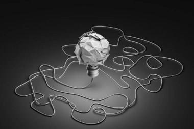 A paper crump light bulb at the center with complex, tangled wires represents challenging ideas, inspiration, problem-solving, and overcoming obstacles.