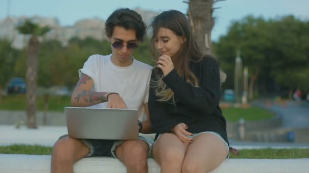 Young Man Showing Laptop Screen Woman Outdoor — Stock Video