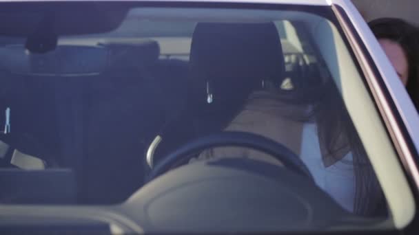 Tired Lady Brown Coat Sits White Car Leather Seat Nods — Stock Video