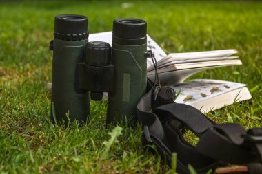 Binoculars and Bird Guide clipart
