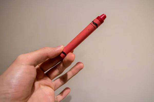 Crayon Vermelho Mão Fundo — Fotografia de Stock