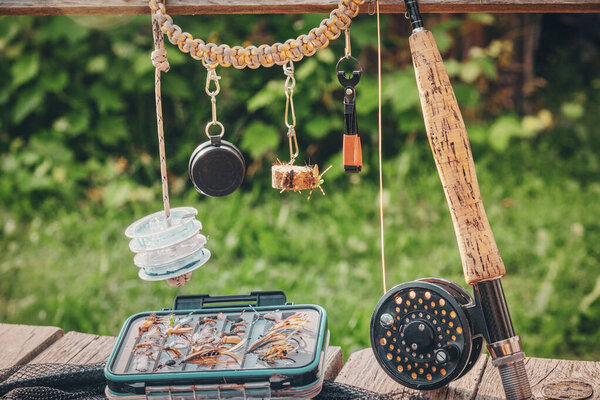 Fishing equipment. Rod, box with flies and landing nets.