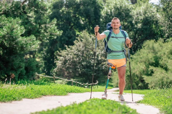 Enthusiastic Young Man Trying Nordic Walking While Staying Active Spite — Stock Photo, Image