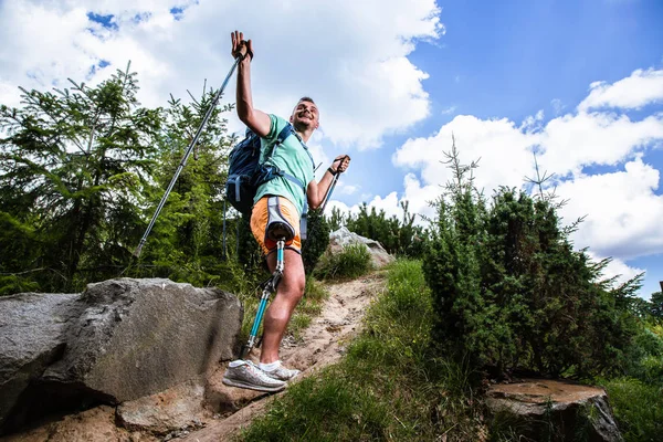 Pleasant Smiling Man Prosthesis Trying Nordic Walking While Feeling Happy — Stock Photo, Image