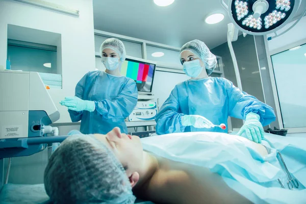 Doctor Forceps Holding Bloody Piece Cotton Wool Her Patient Colleague — Stock Photo, Image