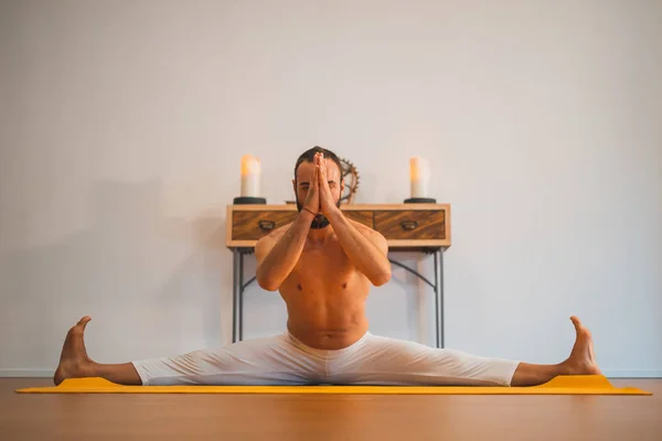 Yoga. Young man doing yoga exercise. Yoga lifestyle healthy concept.