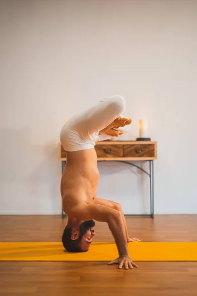 Yoga. Young man doing yoga exercise. Yoga lifestyle healthy concept.
