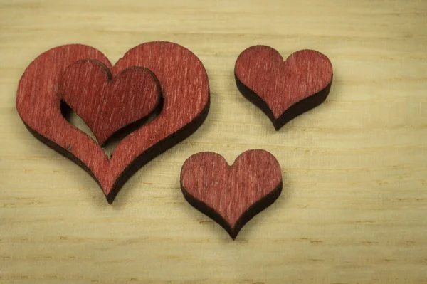 Laser Cut Red Wooden Heart Shapes Light Wood Surface Background — Stock Photo, Image