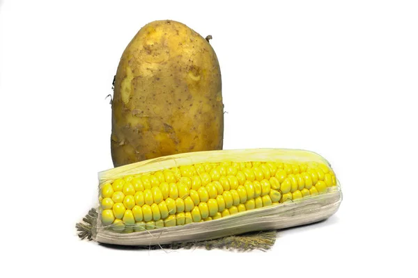 Sweetcorn cob and potato on a square of hessian — Stock Photo, Image