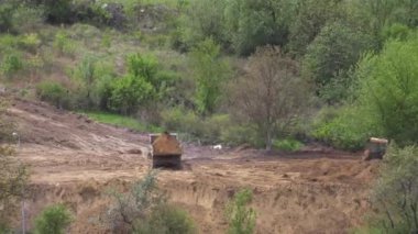 Zaman Alanı: İnşaat alanındaki buldozer düzleştirme yüzeyi
