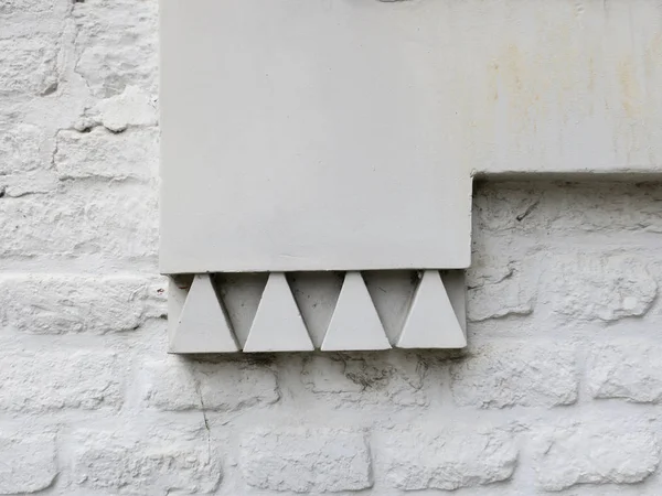 Primer plano de un detalle de una pared de ladrillo pintado blanco — Foto de Stock