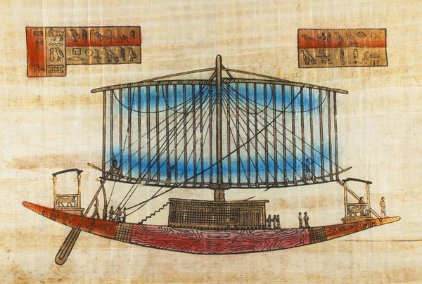 Ancient Egypt. People manage a sailing ship that transports loads to different countries