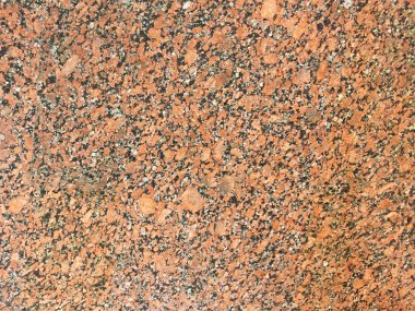 Feldspat, mika ve kuvars sıçramalarına oluşan kırmızı granit taş