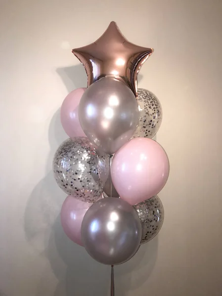 Composition of helium balloons silver and pink, cristal balloons with silver confeety as well as a pink star