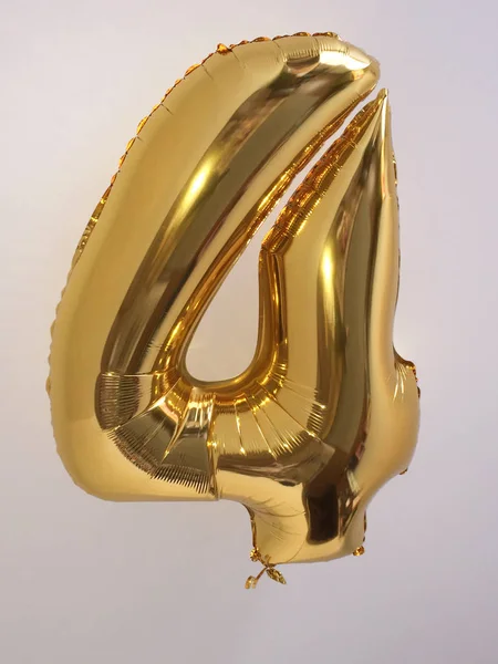 Large Helium Balloon Shape Figure Four Bright Gold Color — Stock Photo, Image