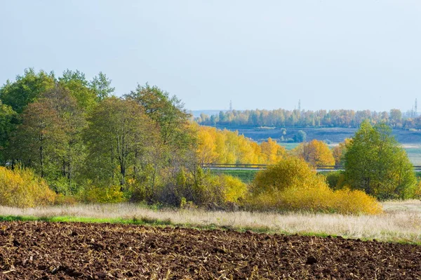 Autumn landscape Autumn arable land. of land used or suitable for growing crops. Indian summer is a period of unseasonably warm, dry weather that sometimes occurs in autumn in the Northern Hemisphere.