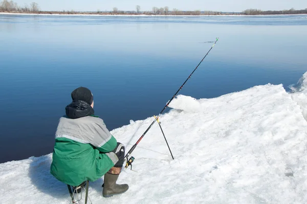 River flood fishermen. Torn river ice fishermen. River with the last ice fishermen on the ice. Russia Tatarstan Kama river in early spring