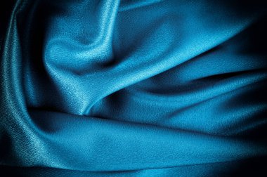 Doku, arka plan. şablon. İpek kumaş mavisi, mavi ipek kumaş ve avludaki döşeme kumaşı - koyu perdeler - sırt ve yastıklar için katı kumaşlar