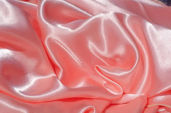 Doku, arka plan, desen. Astar kadın elbise ışık turuncu, turuncu bez astar. Kumaş mercan ipek