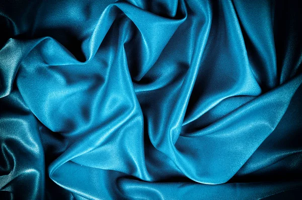 Texture, background. template. Silk fabric blue, Blue silk drapery and upholstery fabric from the courtyard - Dark curtains - Solid fabrics for backs and pillows