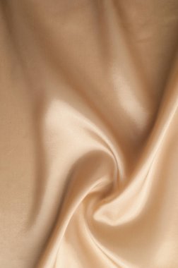 Doku arka planını kumaş. Bej kumaş. İpek kumaş duvar kağıdı doku arka plan deseni sepya pastel sarı krem bej renk tonu: güzel doğal ipek dokulu Tekstil