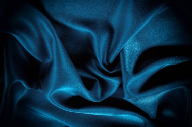 Doku, arka plan. şablon. İpek kumaş mavisi, mavi ipek kumaş ve avludaki döşeme kumaşı - koyu perdeler - sırt ve yastıklar için katı kumaşlar
