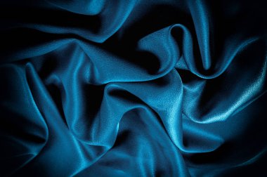 Doku, arka plan. şablon. İpek kumaş mavisi, mavi ipek kumaş ve avludaki döşeme kumaşı - koyu perdeler - sırt ve yastıklar için katı kumaşlar