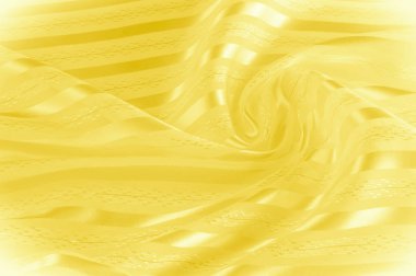 Arka plan doku, desen. Hafif bir şerit ile sarı ipek kumaş. Sarımsı doku. Pürüzsüz zarif sarı saten arka plan.