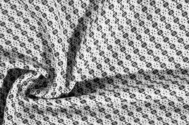 Daireler bir deseni ile gri pamuk bez nedir. Alanınızın bu flint geometrik Jakarlı ile endüstriyel tasarımın bir ipucu ekleyin. Geometrik tasarım alternatifleri arasında iki parlak nötr tonları