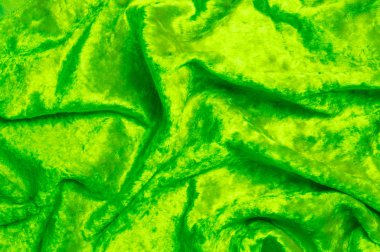 Doku, arka plan, desen. Yeşil kadife kumaştır. Mikro kadife kumaş bir ipeksi pürüzsüz hissi veriyor bir yüksek kaliteli polyester kumaş olduğunu.