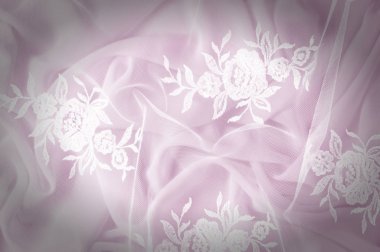 Doku, arka plan, desen. Dantelli beyaz kumaş. Çiçek dantel kumaştan yapılmış. Pembe ipek kumaş. tebrik kartı. Masaüstü duvar kağıdı. Tasarımcı için ekran koruyucu zemin