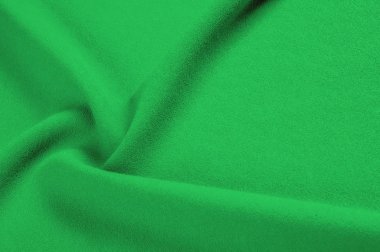 Doku, arka plan, desen. Yeşil, salata renkli ipek kumaş. Yeşil kumaş dokusu. Yeşil kumaş doku ve arka plan görünümünü kapatın. Arka plan ve doku tasarımcılar için.