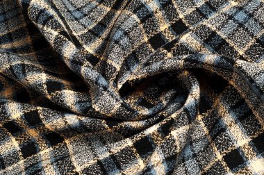 doku, arka plan, desen. Yünlü kumaş bir kafeste. Kumaş yapısı. Moda. Stil. Bir kare desen. Tekstil için model. Moda tasarımı ve iç tasarım evde