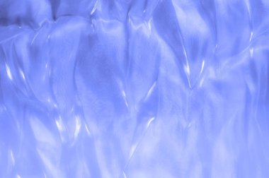 kumaş, arka plan doku. İpek mavi, bez. Zarif ve mükemmellik için dokulu, bir cömert'ipek tasarım parlayan mavi bölüm boyunca dalgası yaratıyor.