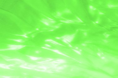 kumaş, arka plan doku. İpek yeşil, salata, bez. Ruh U sınıfların. Bu parlak malzeme stil ekleme ve tasarımınız için parlama garanti gerçekten yumuşak ve pürüzsüz bir yüzey dokusu vardır