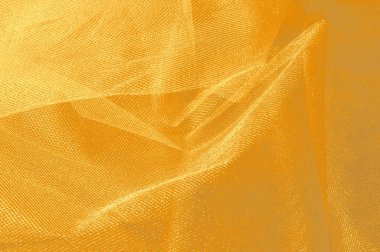 Doku, arka plan, desen. Sarı ipek kumaş. Pürüzsüz zarif altın ipek arka plan olarak kullanabilirsiniz. Altın saten Tekstil arka plan. 
