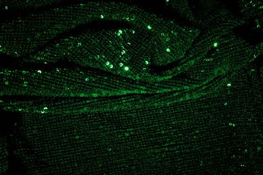 Doku, arka plan, desen, ile yeşil kumaş. Payetler payetler bu kumaş üzerine her açıdan göz kapmak üst üste gelen düz çizgiler içine dikilir ile bir açıklama yapmak.