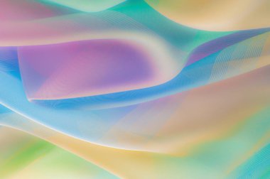 Bulanık, değil keskin netlik doku, arka plan, desen. İpek kumaş şeffaf, sarı-pembe yeşil mavi olduğunu. Soyut yumuşak şifon doku arka plan. 