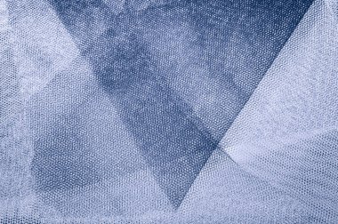 Doku, arka plan, desen. Pastel mavi bir renk gri kumaş. Nazik bir bahar. Pastel Yeşil, mavi, gri, noktalı resim. Arka plan tasarımcı için