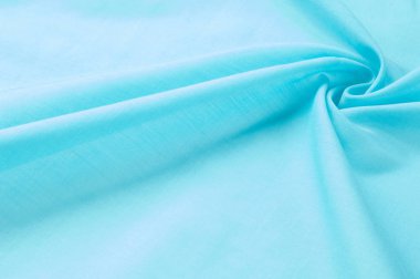 Doku arka planını kumaş. Mavi kumaş, aqua, mavi, Bondi mavi, gök mavisi, mavi mavi, pembe yumurta mavi, Skobelov, Turkuaz, çiçek adları ipek. İpek veya saten yumuşak zarif mavi bir arka plan olarak kullanılabilir